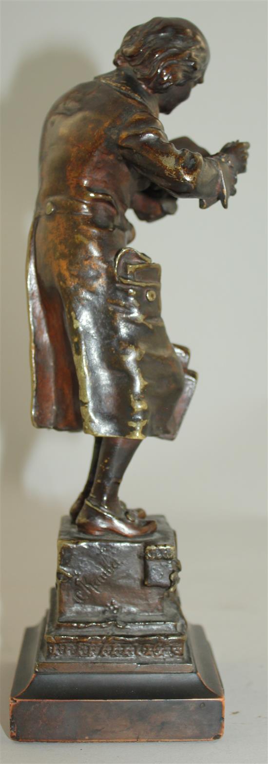 Karl Kauba (1865-1922). A bronze A Bookworm, 1922, 10in.